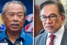 Anwar, Muhyiddin settle defamation suits