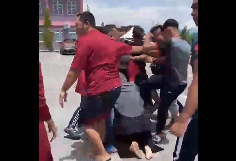 Cops arrest 11 men as suspects after video of fight goes viral