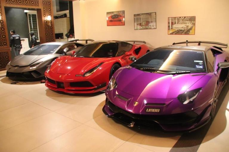 Datuk arrested with RM100 mln in cash, gold, luxury cars