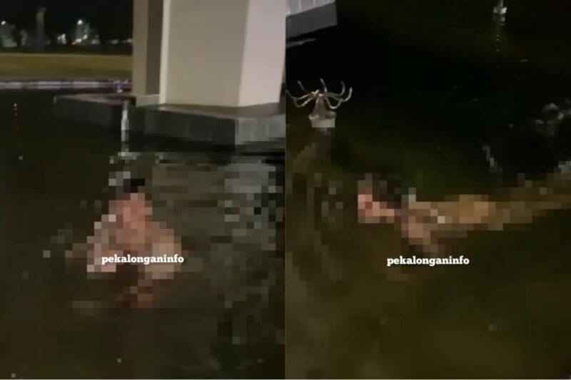 Lelaki mandi telanjang di kolam air pancut awam