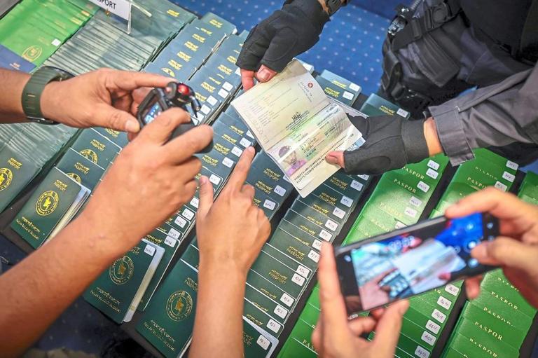 Immigration Dept busts fake passport syndicate