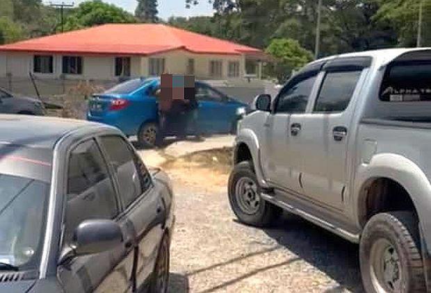 Video of two men fighting for right of way on narrow road in Sabah goes viral