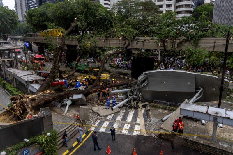 Tree falls on road, monorail track in KL city centre during storm, blocking road traffic and disrupting train service